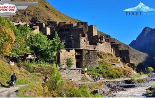 Motorcycle tour along an old castle
