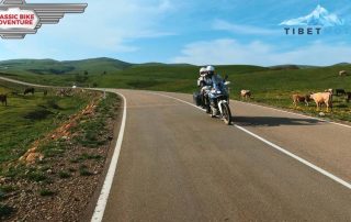 Motorcyclist drives around a curve in Georgia Armenia