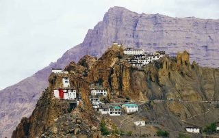 Structures built directly into a mountain in India
